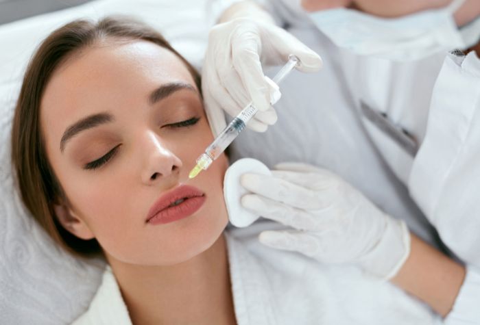 A woman having a Dermal Fillers, a service offered at Evexia Medspa in Tysons Corner, VA.