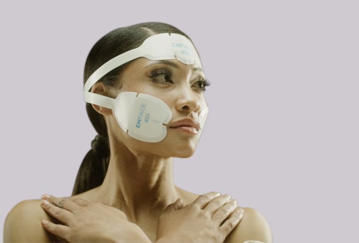 A woman undergoing Emface, a service offered at Evexia Medspa in Tysons Corner, VA.