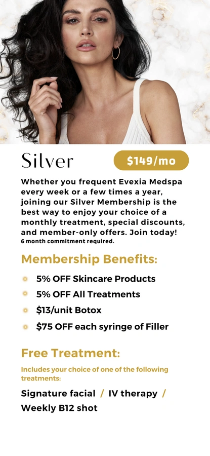 Gorgeous woman with perfect skin and thick wavy hair models the Silver Membership benefits at Evexia Medspa. 